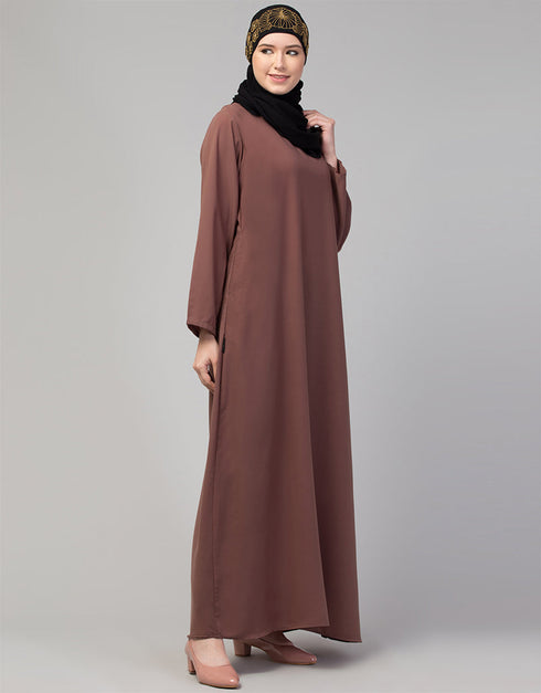 Trendy Abaya made from Nida fabric with a flared hem for a feminine touch In Color Light brown